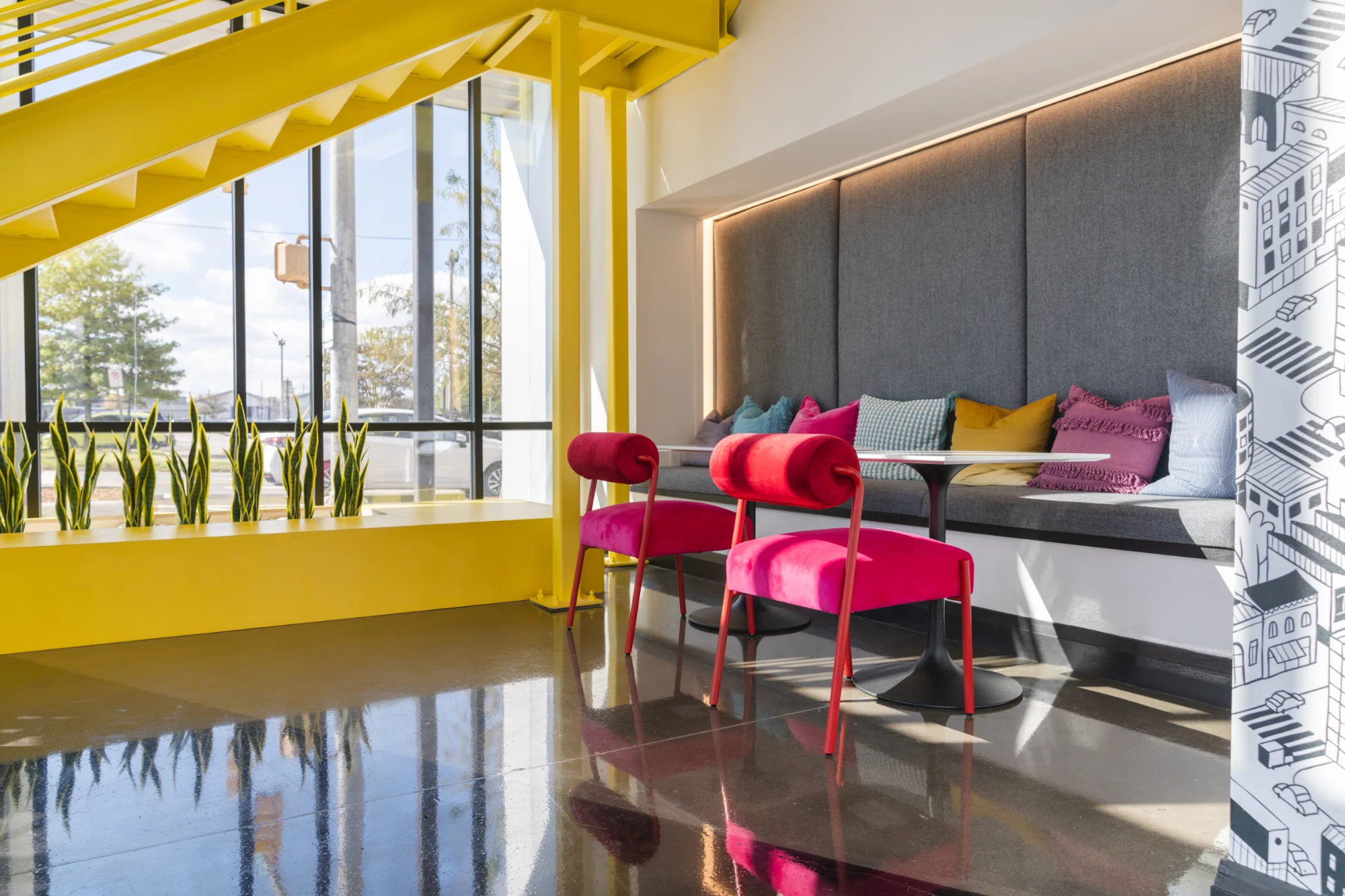 BHAM.ORG colorful office meeting space with yellow accents